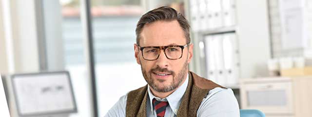 eye exam, man wearing hoya computer lenses in Bolton, ON
