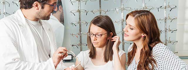 optometrist, womans selecting hoya lenses in Bolton, ON